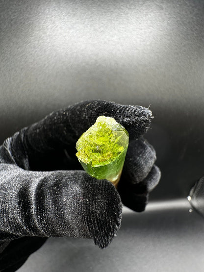 Raw tri-color watermelon tourmaline crystal in green and peach from Pakistan, alternate angle