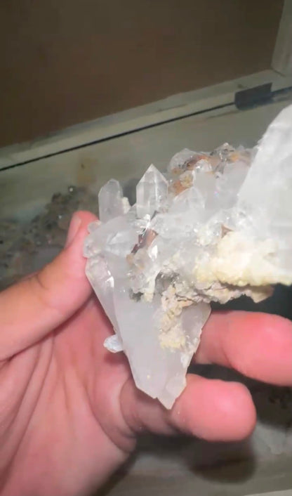 Bundle of natural Morganite, Apatite and Pyrite mineral specimens, angled view